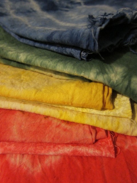 Red, yellow, green blue dyed fabrics