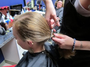 Headshave Sarah cutting ponytail