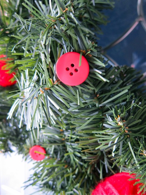 Button on Christmas button wreath