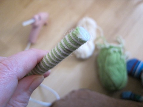 Finish attaching yarn to candy cane