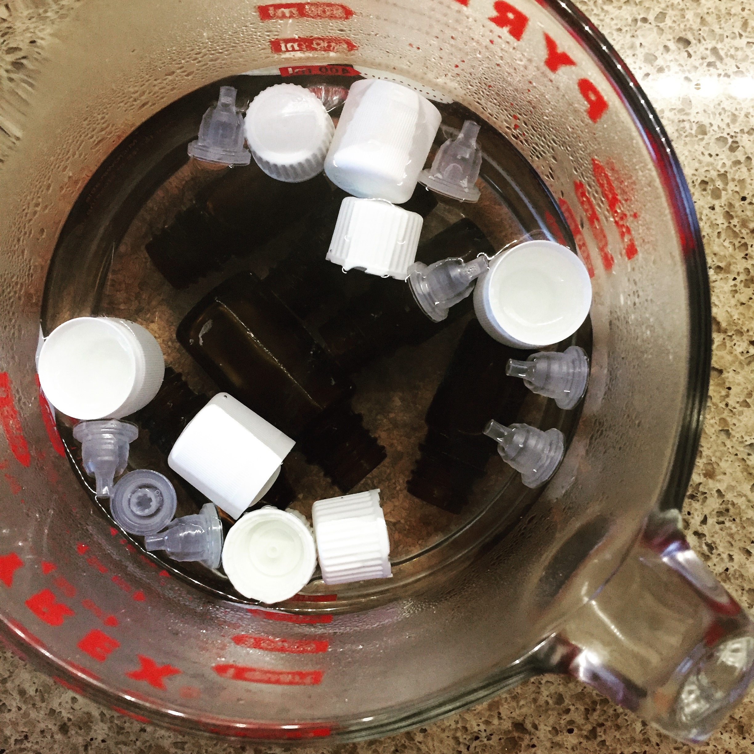 Living With Essential Oils: How to Clean Your Empty Bottles ~ DIY Blog post by Bubblegum Sass 