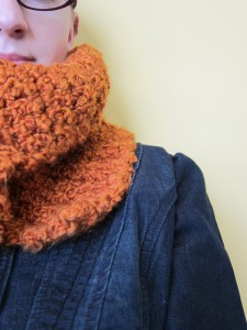 Woman wearing orange scarf