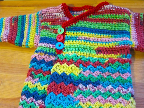 Crochet rainbow baby sweater
