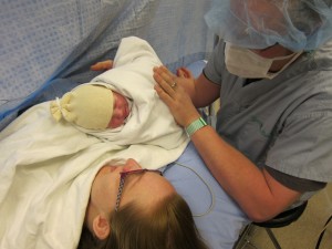 Sam with mom & dad in the OR