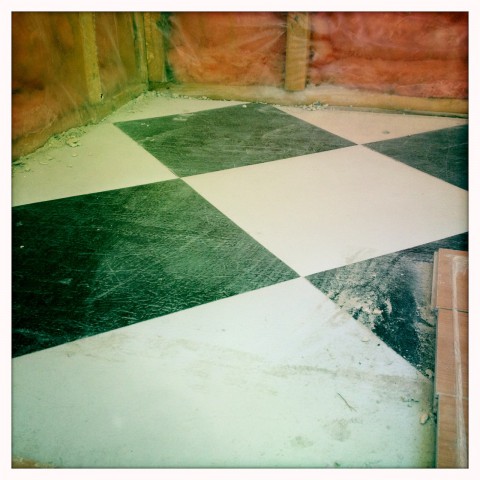 Old black and white checkered floor